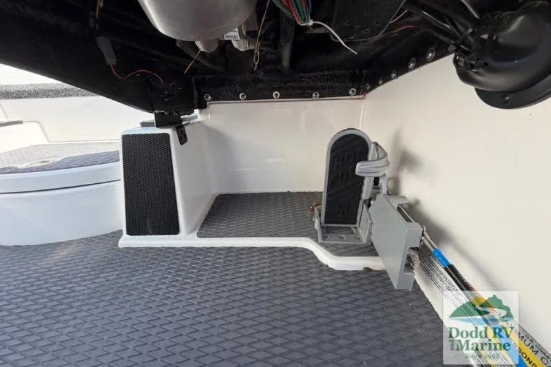 Slide: The Image of 2021 Caymas CX 18 SS boat interior showing pedal and wiring details. - 12