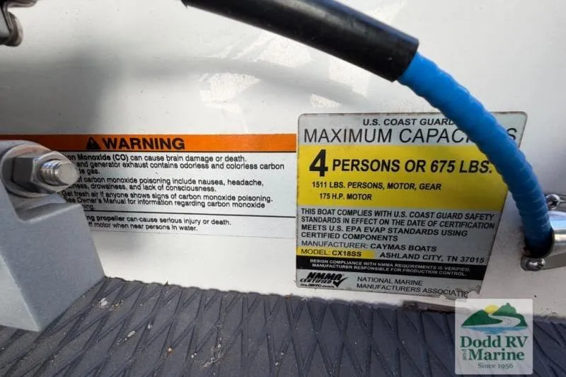 Slide: The Image of 2021 Caymas CX 18 SS capacity label, warning details, and Dodd RV Marine logo. - 20
