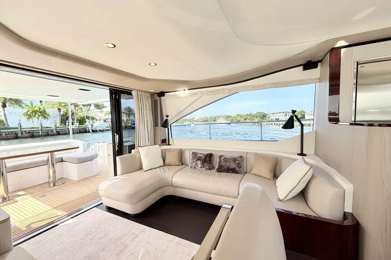 Slide: The Image of Luxurious interior of 2021 Azimut Fly 60 yacht with elegant seating and waterfront view. - 21