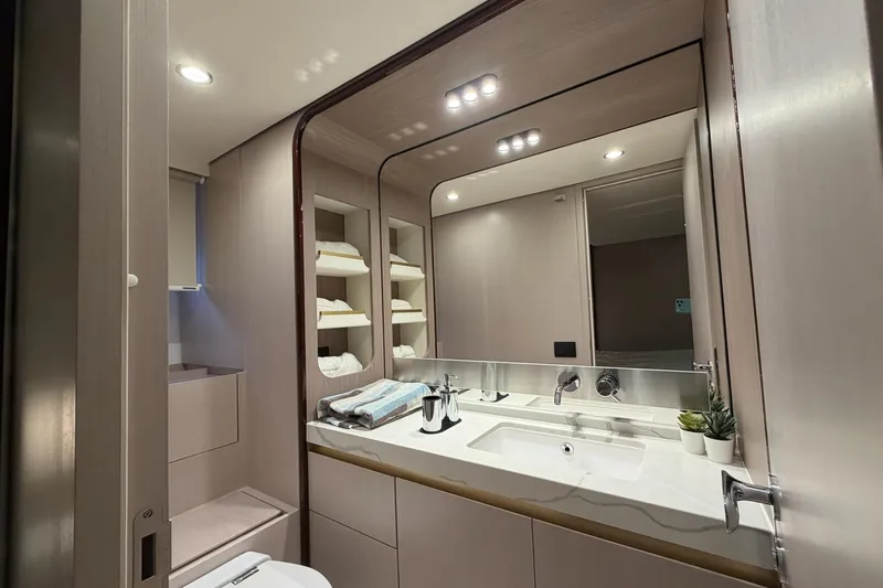 Slide: The Image of Luxurious bathroom interior of 2021 Azimut Fly 60 yacht with modern fixtures and elegant design. - 53