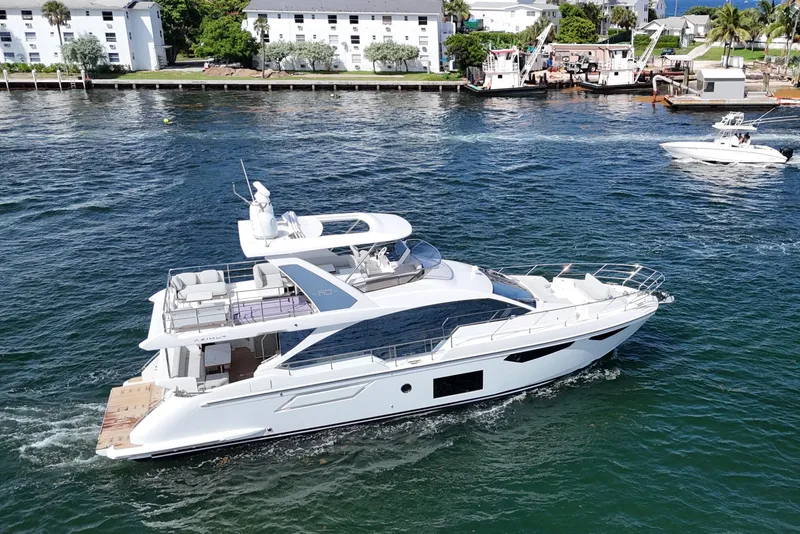 Slide: The Image of Azimut Fly 60 yacht cruising on a sunny day, 2021 model. - 7