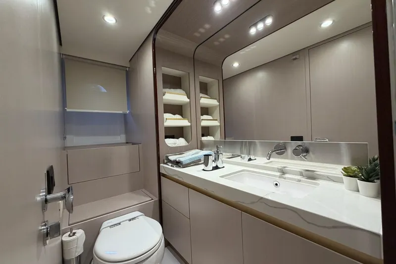 Slide: The Image of Luxurious bathroom interior of 2021 Azimut Fly 60 yacht, featuring modern fixtures and elegant design. - 46