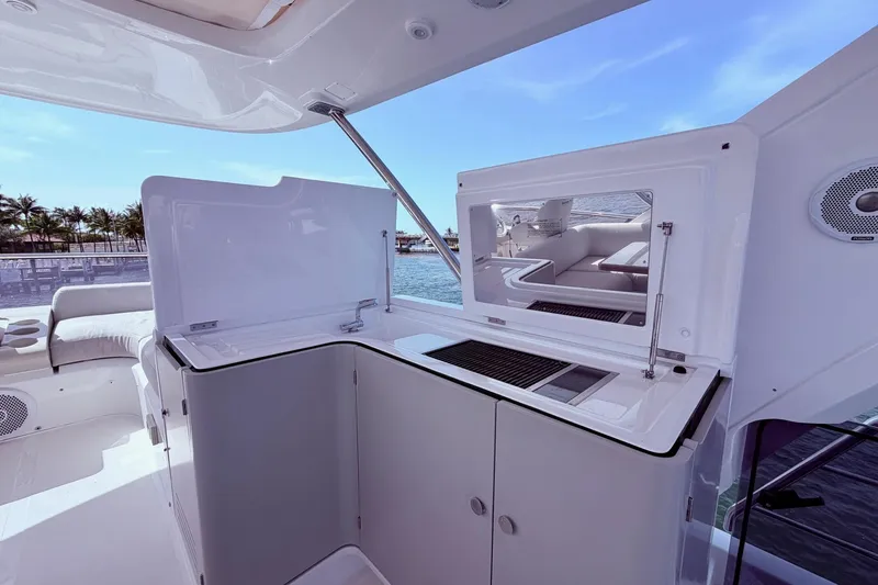 Slide: The Image of Luxurious 2021 Azimut Fly 60 yacht interior with sleek kitchenette and ocean view. - 32