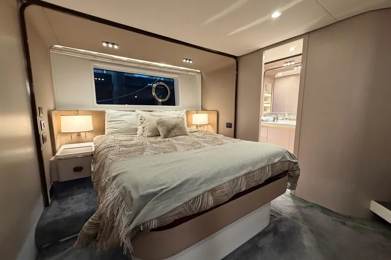 Slide: The Image of Luxurious bedroom interior of 2021 Azimut Fly 60 yacht with elegant decor and ambient lighting. - 40