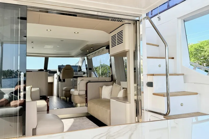 Slide: The Image of Luxurious interior of 2021 Azimut Fly 60 yacht with modern seating and elegant design. - 9
