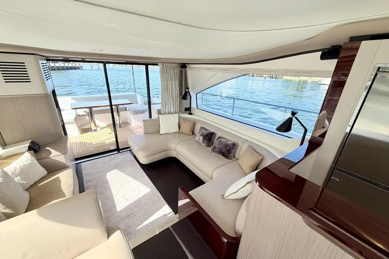 Slide: The Image of Luxurious interior of 2021 Azimut Fly 60 yacht with elegant seating and ocean view. - 17