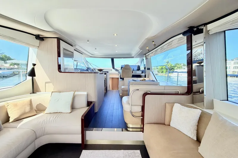 Slide: The Image of Luxurious interior of 2021 Azimut Fly 60 yacht with elegant seating and panoramic windows. - 18