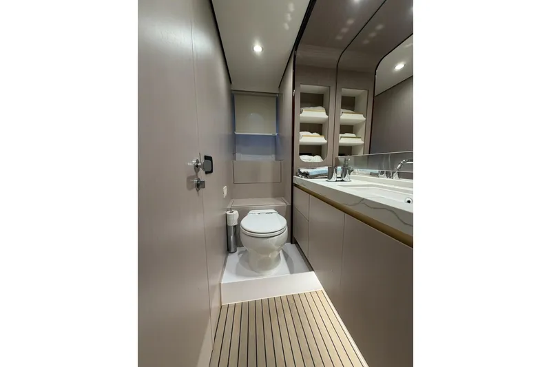 Slide: The Image of Luxurious bathroom interior of 2021 Azimut Fly 60 yacht, featuring modern fixtures and elegant design. - 50