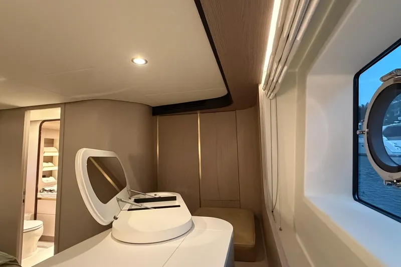 Slide: The Image of Luxurious interior of 2021 Azimut Fly 60 yacht with modern design and porthole view. - 45