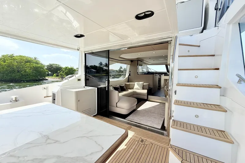 Slide: The Image of Luxurious interior of 2021 Azimut Fly 60 yacht with elegant seating and modern design. - 8