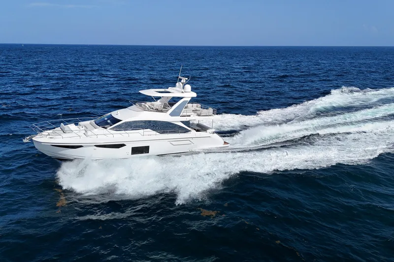 Slide: The Image of Luxury Azimut Fly 60 yacht cruising on open sea, 2021 model. - 39