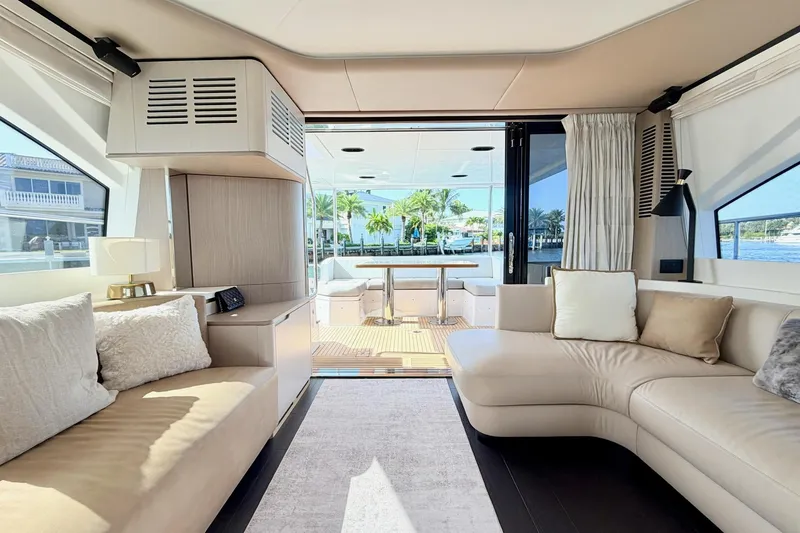 Slide: The Image of Luxurious interior of 2021 Azimut Fly 60 yacht with elegant seating and scenic views. - 15