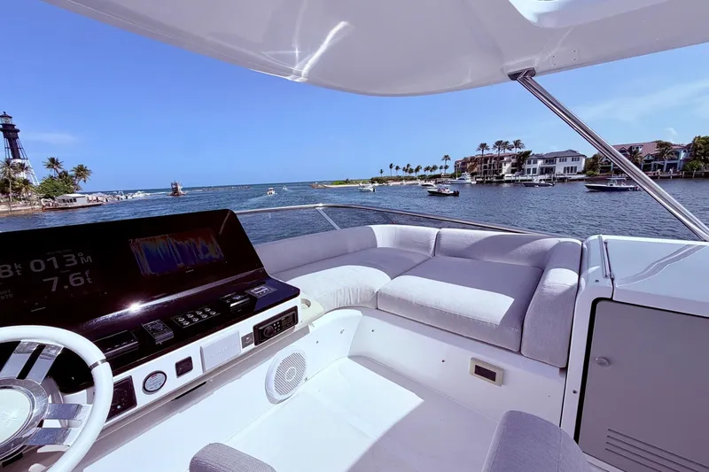 Slide: The Image of Luxurious 2021 Azimut Fly 60 yacht interior with ocean view and modern dashboard. - 34