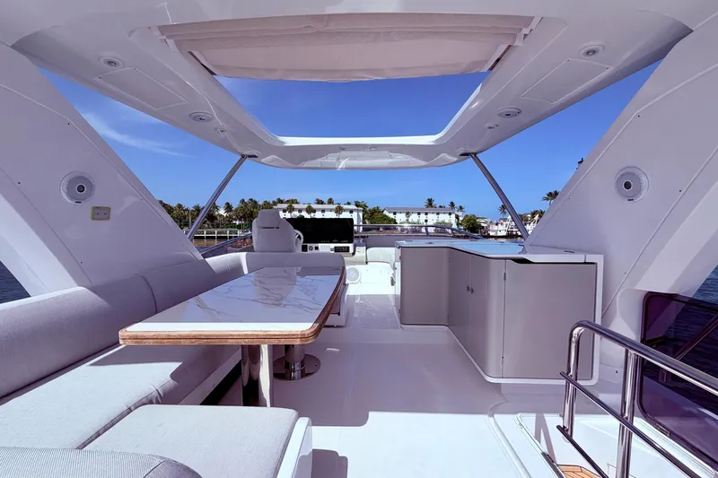 Slide: The Image of Luxurious 2021 Azimut Fly 60 yacht interior with elegant seating and dining area. - 30