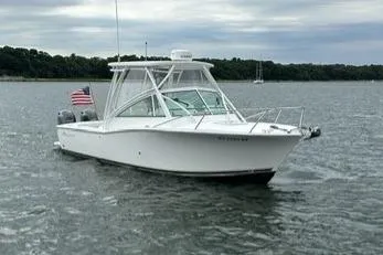 The Image of 2019 Albemarle 25 Express boat on calm water with American flag. - 0