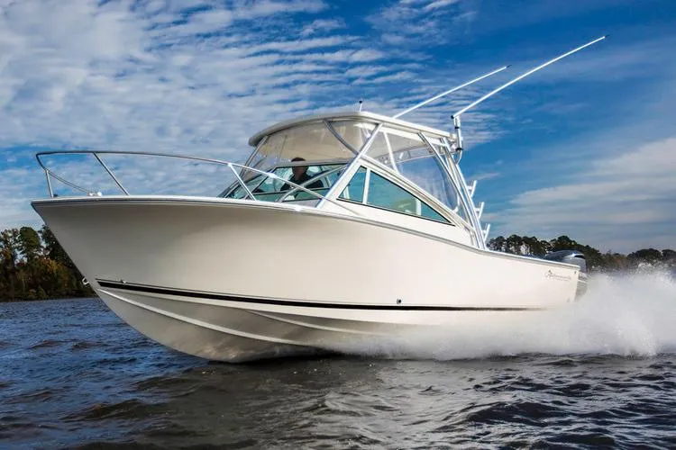 Slide: The Image of Manufacturer Provided Image: 2019 Albemarle 25 Express boat cruising on water under a blue sky. - 32