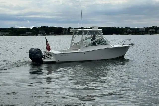Slide: The Image of 2019 Albemarle 25 Express boat on calm water with American flag. - 6