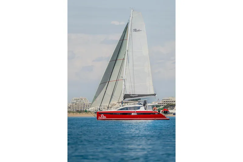 Slide: The Image of Red Privilege Signature 510 yacht sailing on calm waters, 2025 model. - 73