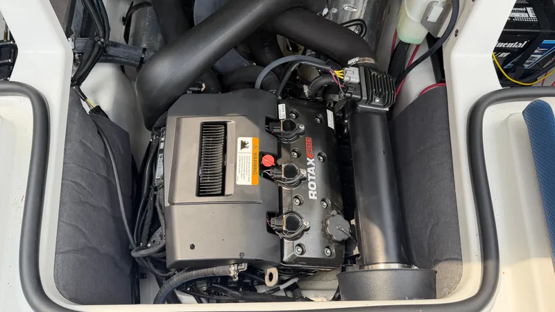 Slide: The Image of Engine compartment of a Scarab 195 ID boat with a Rotax engine. - 24