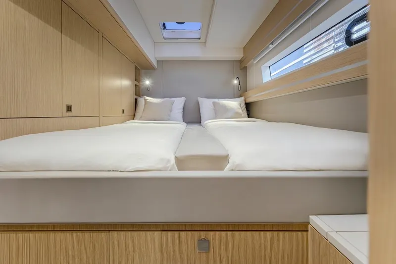 Slide: The Image of Luxurious bedroom in Privilege Signature 510 yacht, model year 2025. - 33