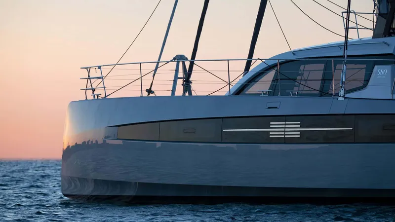 Slide: The Image of Luxury Privilege Signature 580 yacht at sunset, 2025 model, on calm ocean waters. - 4