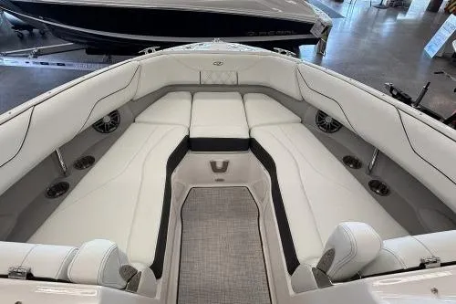 Slide: The Image of 2027 Regal LS4 boat interior with luxurious white seating and modern design. - 6