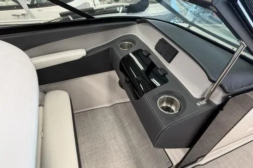 Slide: The Image of 2027 Regal LS4 boat interior with cup holders and sleek dashboard design. - 9