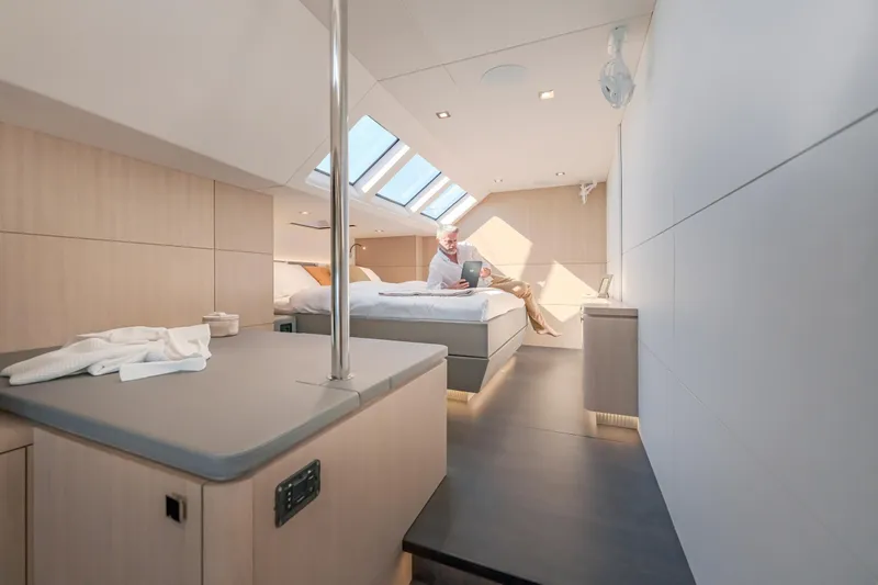Slide: The Image of Luxurious interior of 2025 Privilege Signature 650 yacht with modern design and skylights. - 25