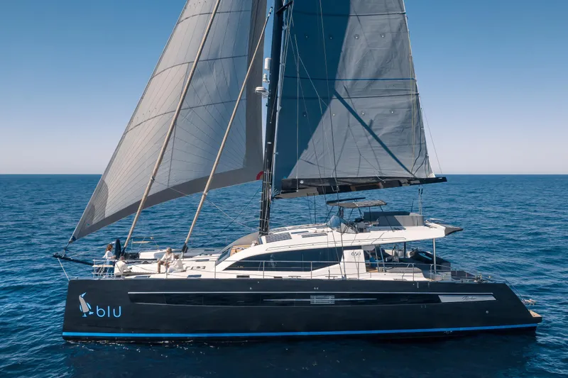 Slide: The Image of Luxury sailing yacht Privilege Signature 650, 2025 model, cruising on open sea. - 4
