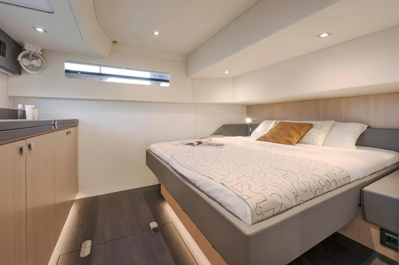 Slide: The Image of Luxurious bedroom interior of 2025 Privilege Signature 650 yacht, featuring modern design and cozy ambiance. - 38