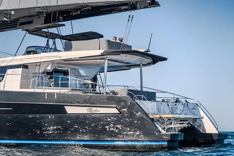 Slide: The Image of Luxury Privilege Signature 650 yacht sailing on open water, 2025 model. - 4