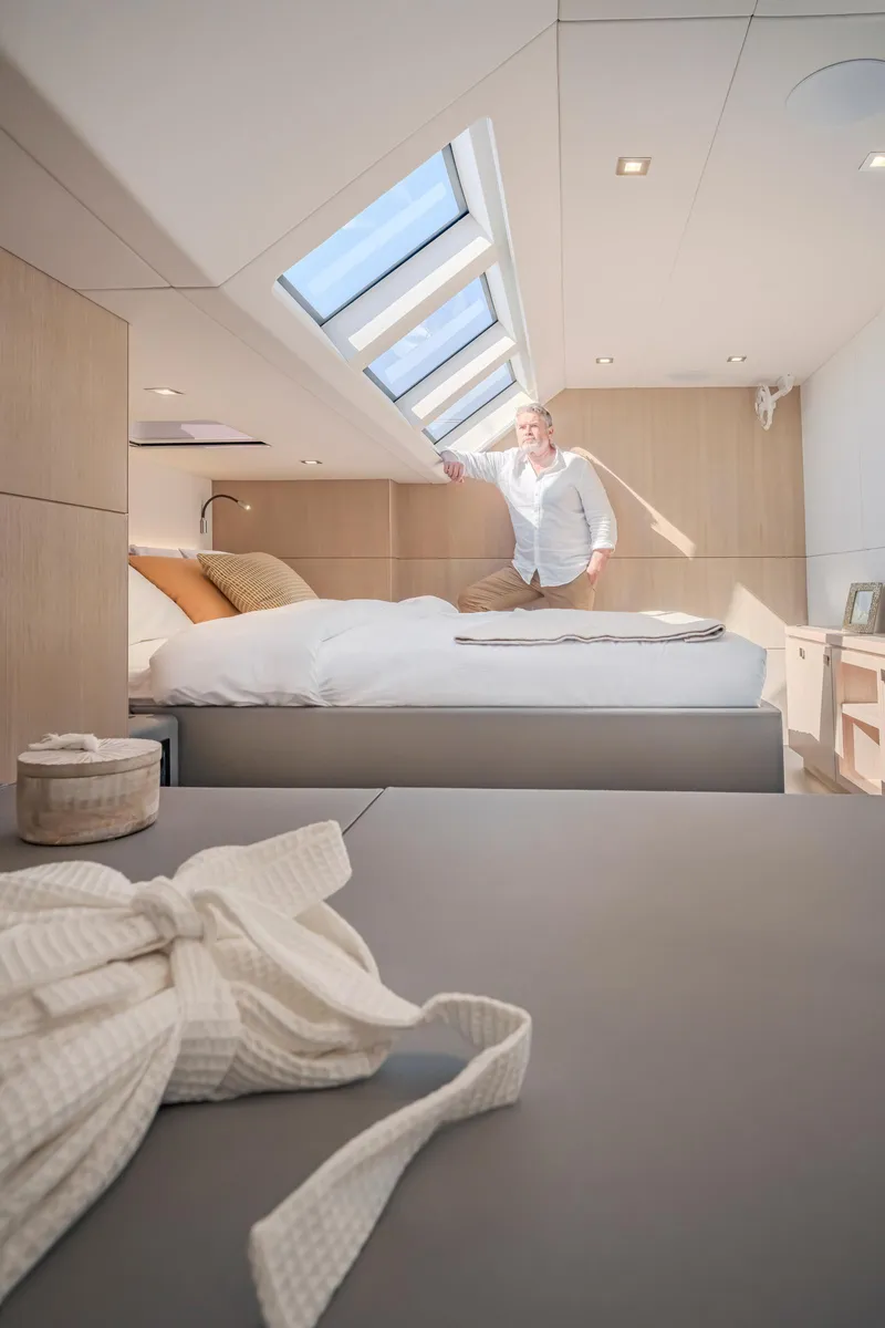 Slide: The Image of Luxurious interior of 2025 Privilege Signature 650 yacht with skylight and modern design. - 22