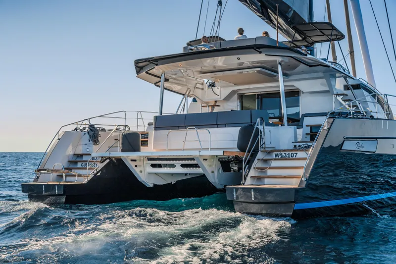 Slide: The Image of Luxury Privilege Signature 650 yacht sailing on open sea, 2025 model. - 2