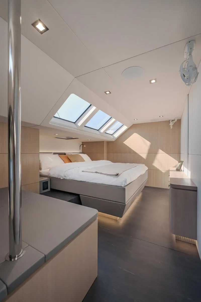 Slide: The Image of Luxurious bedroom interior of 2025 Privilege Signature 650 yacht with skylights and modern design. - 29