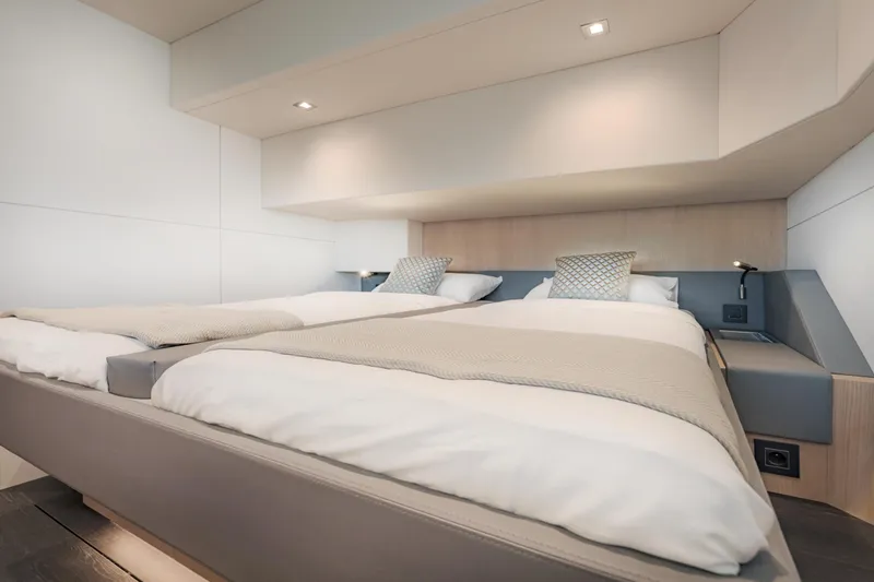 Slide: The Image of Luxurious bedroom interior of 2025 Privilege Signature 650 yacht with modern design. - 26