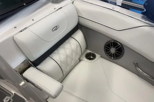 Slide: The Image of Luxurious white seating in 2027 Regal LS2 boat with speaker and cup holder. - 7