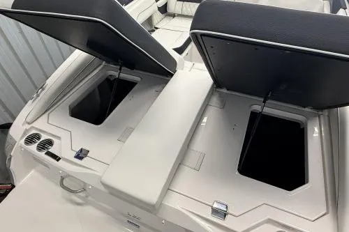 Slide: The Image of 2027 Regal LS2 boat storage compartments open, showcasing spacious design. - 10
