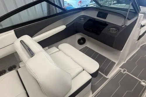 Slide: The Image of 2027 Regal LS2 boat interior with white seating and modern dashboard design. - 8