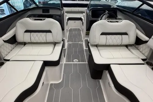 Slide: The Image of Interior of 2027 Regal LS2 boat with luxurious white seating and modern design. - 9