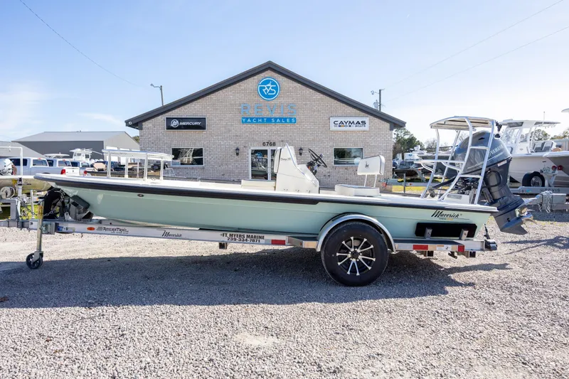 The Image of 2024 Maverick 17 HPX-S boat on trailer at yacht sales dealership. - 1