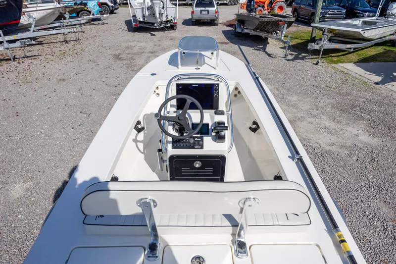 Slide: The Image of 2024 Maverick 17 HPX-S boat interior with steering wheel and control panel. - 9