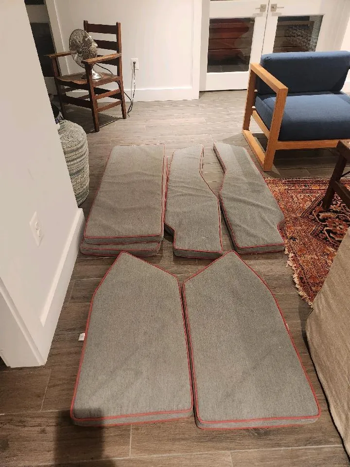 Slide: The Image of Cushions for a 2015 Catalina 275 Sport laid out on a wooden floor. - 31