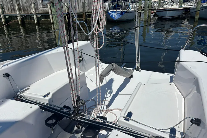 Slide: The Image of 2015 Catalina 275 Sport sailboat cockpit with rigging, docked at marina. - 37