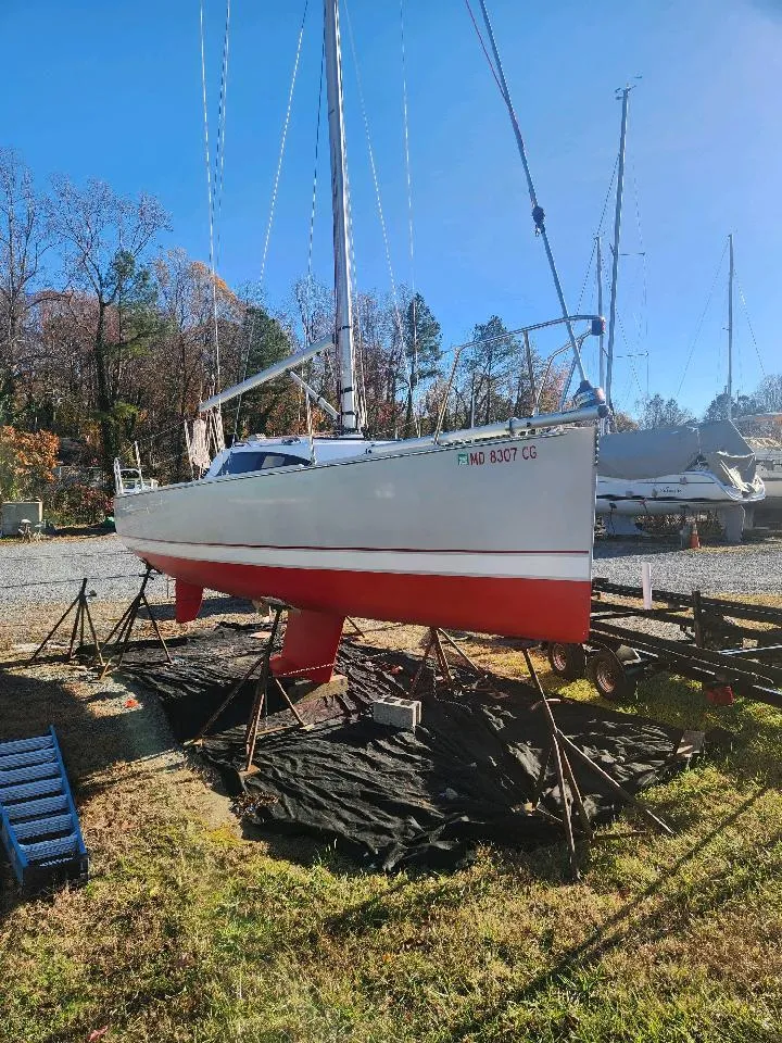 Slide: The Image of A 2015 Catalina 275 Sport sailboat is on a dry dock. - 6