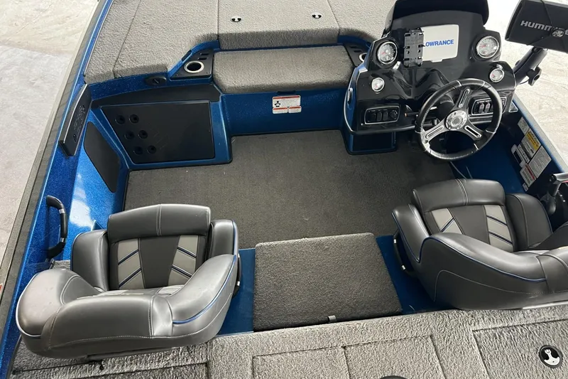 Slide: The Image of Interior of a 2018 Nitro Z18 boat with steering console and seating. - 4