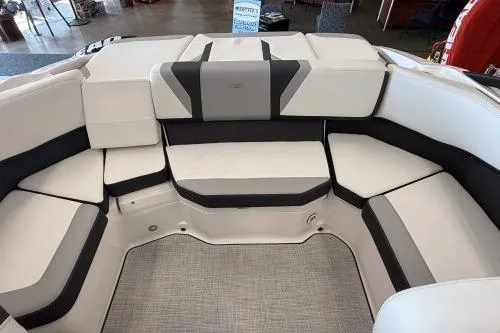 Slide: The Image of 2027 Regal 2000 ES boat interior with cushioned seating and modern design. - 10