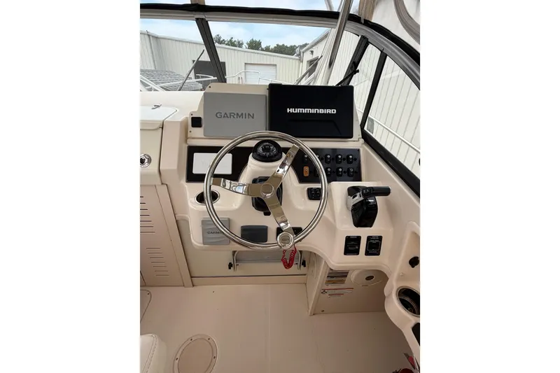 Slide: The Image of Helm of 2017 Grady-White Gulfstream 232 with Garmin and Humminbird electronics. - 7