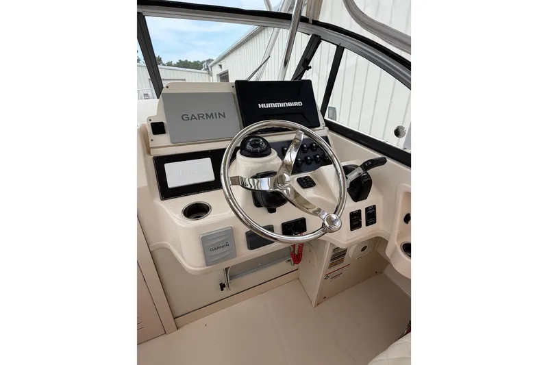 Slide: The Image of Helm of 2017 Grady-White Gulfstream 232 with Garmin and Humminbird electronics. - 6