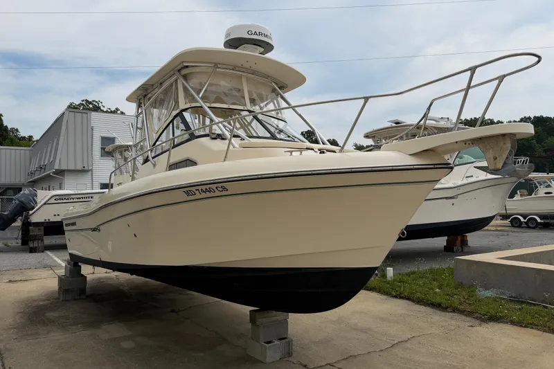 Slide: The Image of 2017 Grady-White Gulfstream 232 boat on display, featuring Garmin equipment. - 4