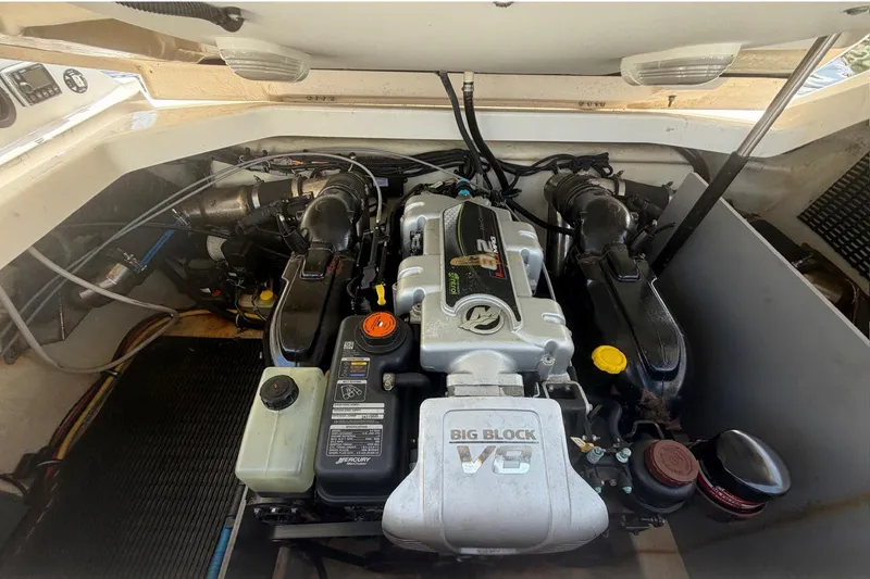 Slide: The Image of Engine compartment of a 2015 Monterey 288SS Super Sport with a large V8 engine. - 26